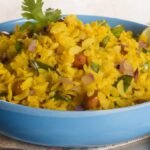 हाई-प्रोटीन पोहा विथ पनीर एंड स्प्राउट्स (High-Protein Poha with Paneer and Sprouts)वजन घटाने में मददगार पनीर, मटर और मूंग स्प्राउट्स से बना स्वादिष्ट हाई-प्रोटीन पोहा। | (Photo- Getty Image)