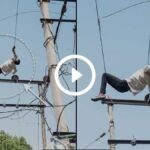 viral video maharajganj man resting on 11000 volt electric pole